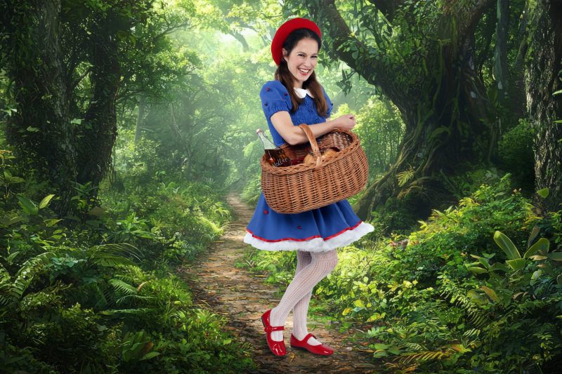 Discover a winding path through a lush, overgrown jungle forest, where sunlight filters through dense trees, inviting exploration and tranquility amidst nature's beauty.